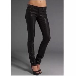 J Brand coated/waxed black jeans